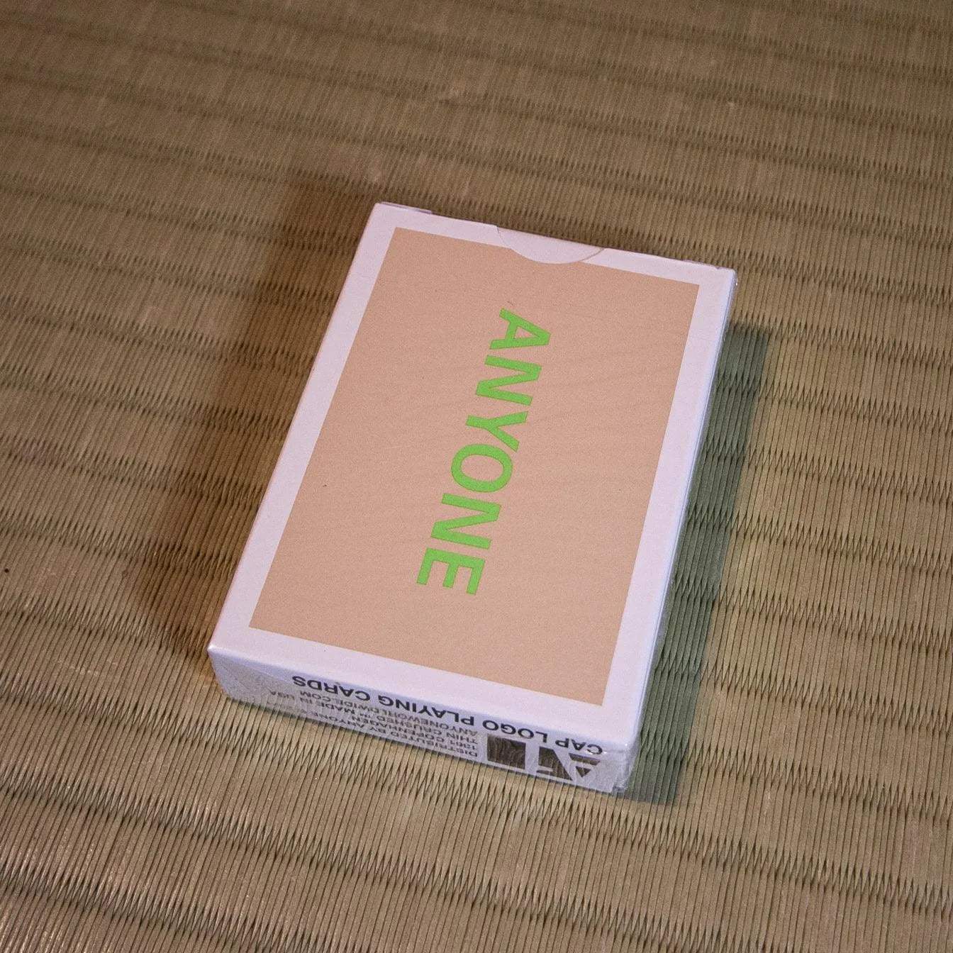 Anyone Worldwide Beige/Green Cap Logo Playing Cards