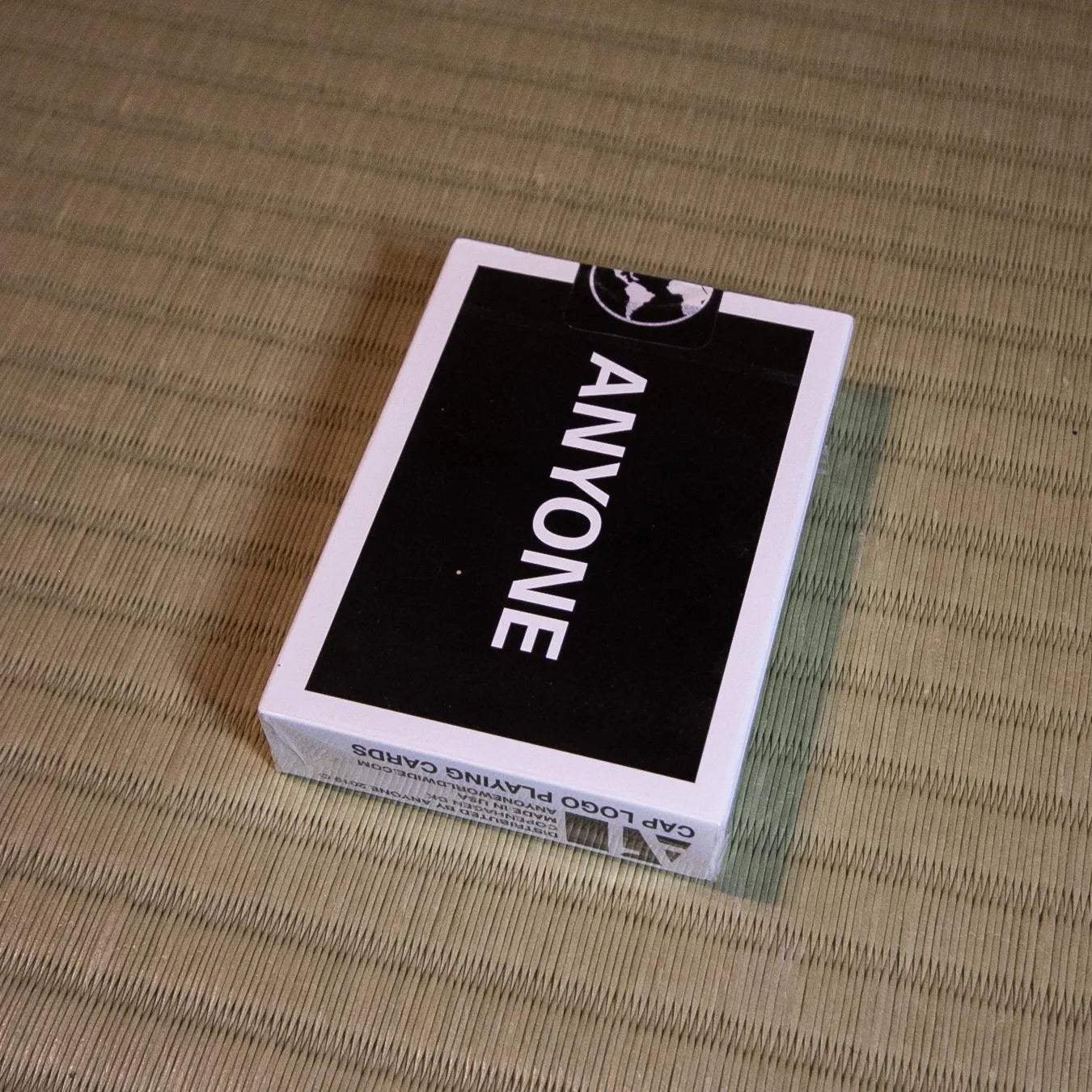 Anyone Worldwide Black Cap Logo Playing Cards
